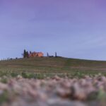 Farmhouse with cypresses in tuscany